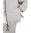 Куртка с капюшоном  бежевого цвета из эластичной полиэфирной водоотталкивающей ткани с вышивкой орла в тон на груди Aeronautica Militare