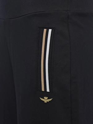 Костюм в черном цвете с джемпером на молнии и брюками палаццо Aeronautica Militare