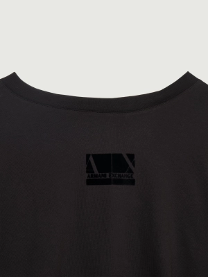 Футболка в черном цвете свободного кроя с логотипом бренда на груди Armani Exchange
