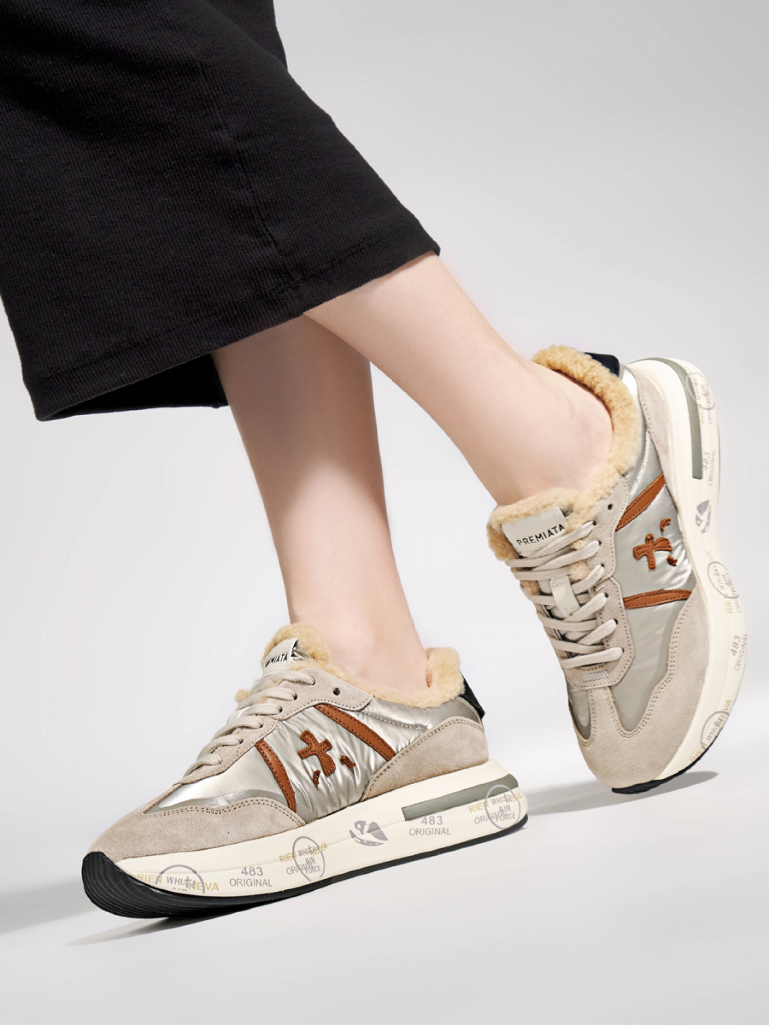Бежевые кроссовки на меху с черным задником Premiata Cassie 6569
