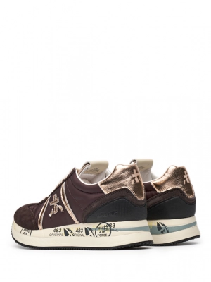 Кроссовки черного цвета с золотистыми вставками Premiata Conny 6980