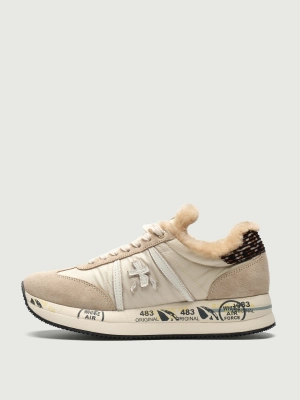 Женские утеплённые кроссовки Premiata CONNY7689M молочного цвета с натуральным мехом