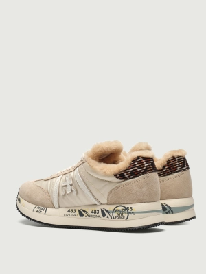 Женские утеплённые кроссовки Premiata CONNY7689M молочного цвета с натуральным мехом