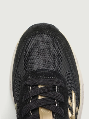 Кроссовки женские Premiata MOERUND7799, черного цвета с желтым логотипом